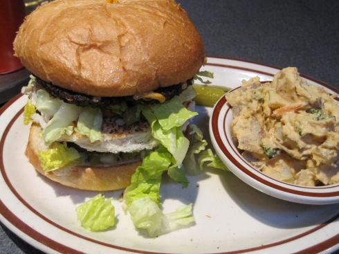 Two no-beef patties, reuben sauce, lettuce, (vegan) cheese, pickles, onions on a sesame-free bun.  Classic! 