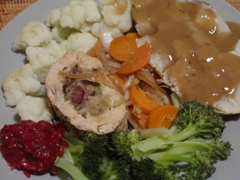 Basted Gardein Holiday Roast with Carrots & Onions, Homestyle Gravy, Pineapple Cranberry Sauce, and Steamed Broccoli & Cauliflower 