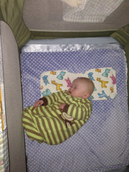 On his side in the travel bed - January 2, 2015